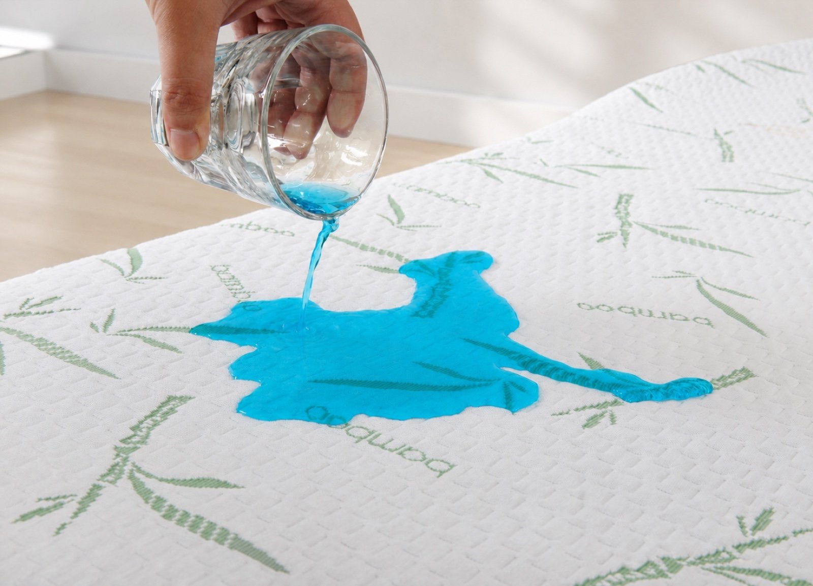 Liquid applied to the mattress protector during a waterproof performance demonstration