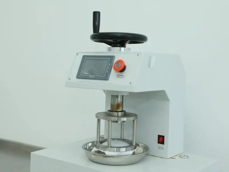 Fabric sample cutting equipment used to prepare material for a GSM sample check